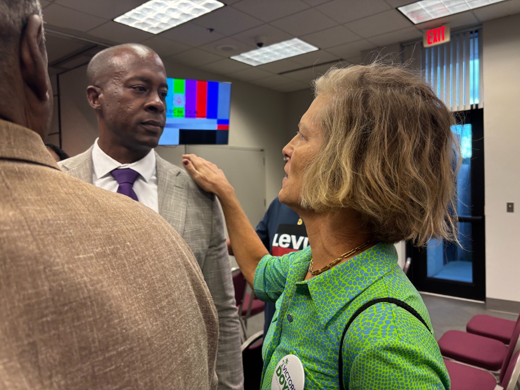 Victoria Doyle meeting with a school board member about public education